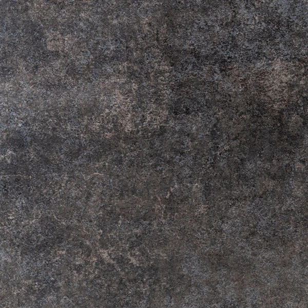 A hand-forged blackened steel plate with a heat-oxide patina and wax finish.