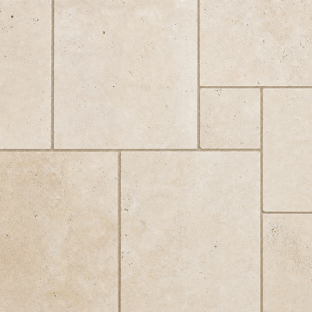 A French-pattern travertine paver in warm cream tone with brushed slip-resistant surface, the classic Palm Beach pool deck.